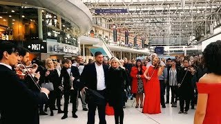 Best Marriage Proposal Ever  Flash Mob Engagement Surprise Orchestra Waterloo Station [upl. by Merriott556]