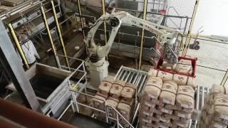 RFA Kawasaki Robot depalletising opening and emptying bags [upl. by Learsi]