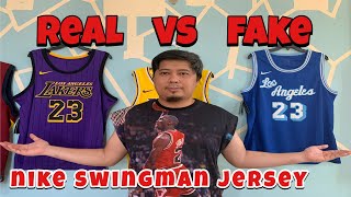 HOW TO SPOT A FAKE NIKE SWINGMAN NBA JERSEY  NEW FAKE HEAT PRESSED VERSION  REAL VS FAKE [upl. by Daffie]