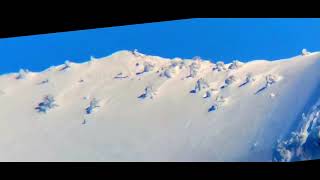 A Bigfoot Captured with Spotting Telescope Running in Deep Snow Up a Wasatch Mountain Peak [upl. by Revert]