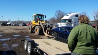 Copart Payloader Loading a Car onto a Trailer the Easy Way [upl. by Irvine733]