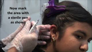 ear piercing with gun  live ear piercing  gunshot painless ear piercing  ear piercing  painless [upl. by Ujawernalo]