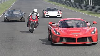 Ducati Superleggera V4 vs Ferrari LaFerrari vs Porsche 918 Spyder vs McLaren P1 at Nordschleife [upl. by Soble]