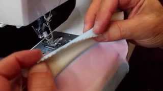 How to Use an Overlock Stitch to Sew Stretch Stitches  TuffSew [upl. by Ahsenor]