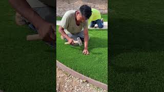 Laying and Nailing Artificial Grass  How to Install Artificial Turf [upl. by Esertal4]