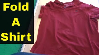 How To Fold A Shirt For TravelSuper Easy Method [upl. by Auston333]