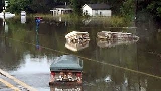 Eerie Coffins Seen Floating Through Flooded Louisiana Streets [upl. by Orianna]