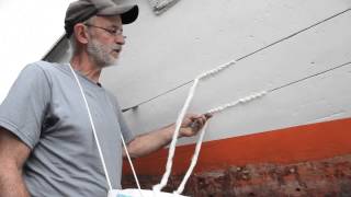 Wooden Boat Building  How to Caulk Wood Planking with Louis Sauzedde [upl. by Yldarb209]