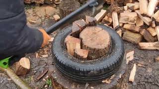 Hout kloven met autoband splitting wood with a tire [upl. by Keryt]