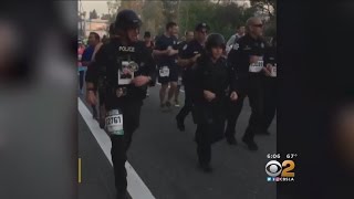 Officers Run LA Marathon In Full Gear To honor Fallen Comrade [upl. by Ashby214]