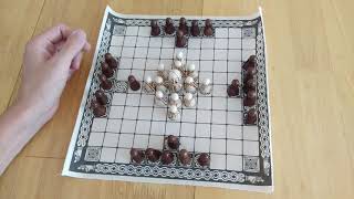 How to play Hnefatafl the Viking boardgame aka Tafl  like Tablut and review AmassGames Hnefetfal [upl. by Elraet288]