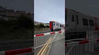 197009 at Deganwy tfw class197 wales deganwy transportforwales train levelcrossing [upl. by Yoral508]