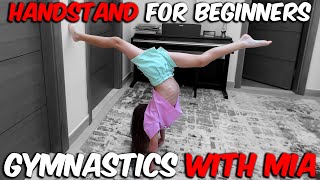 Learning how to do a hand stand in gymnastics for beginners [upl. by Cowie]