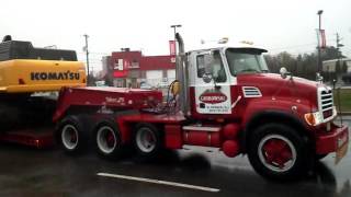 2004 Mack granite pulling Talbert 65 ton lowboy [upl. by Scibert]