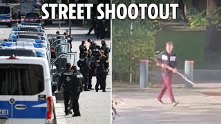 Moment terrorist 18 wields huge WWII rifle before being shot dead by Munich cops in gun battle [upl. by Ennayd123]