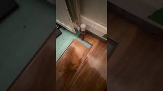 How to lay laminate around radiator pipe diy howtodo flooring [upl. by Enelyahs633]