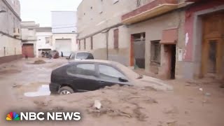 Rivers of mud in Valencia region as Spain experiences deadly flash flooding [upl. by Kerred74]