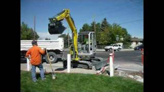 Wacker Neuson 50z3 Compact Excavator sidewalk demolition [upl. by Baer194]