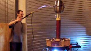 My rotary spark gap Tesla Coil with new topload [upl. by Aneis920]