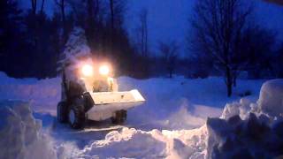 Bobcat A300 Moving Snow Drift [upl. by Pejsach821]