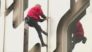 Frances Spiderman climbs skyscraper in Paris [upl. by Eadwina760]