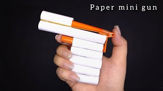 Origami mini gun  How to make paper colt that shoots paper bullets craft [upl. by Aniv]