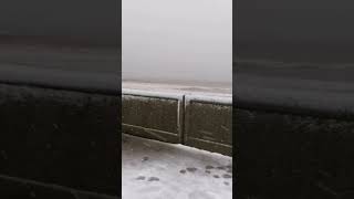 Snowing on Hornsea beach everywhere closed for winter [upl. by Ydualc]