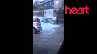 WATCH driver attempts to drive through Penzance during storm [upl. by Ailaht]