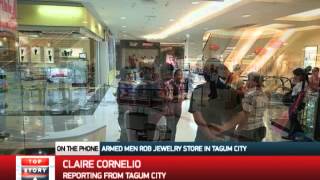 Armed men rob jewelry store in Tagum City [upl. by Latricia946]