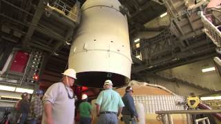 Orion hoisted atop launch vehicle [upl. by Nomihs]