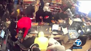 Video Large group ransacks vandalizes 7Eleven store after South LA street takeover l ABC7 [upl. by Ailil]