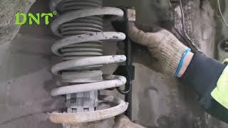 How To UseHow do you compress a coil spring safety by shock spring compressor [upl. by Oremo]