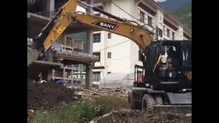 SANY WHEEL EXCAVATOR IN ACTION [upl. by Ilarrold546]