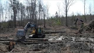 Volvo 210 Excavator Transfering Logs [upl. by Joshi981]