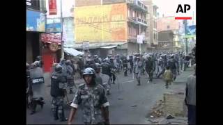 Protestors and police clash in latest violence [upl. by Dahle219]