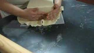 Covering a square cake with fondant [upl. by Jerrome]