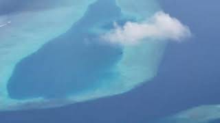 Trans Maldivian Airways Seaplane Flying Over The RitzCarlton Maldives Fari Islands July 2024 [upl. by Anaujait]