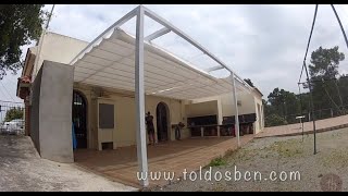 Pergola de hierro de 100x100 con toldo corredero manual tejido Soltis 96 de Serge Ferrari [upl. by Corsetti]