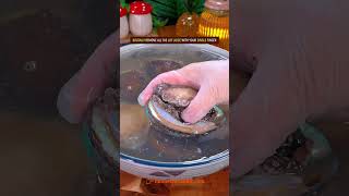 HOW TO CLEAN ABALONE LIKE A PRO recipe cooking abalone seafood shellfish lifehack [upl. by Acirret]