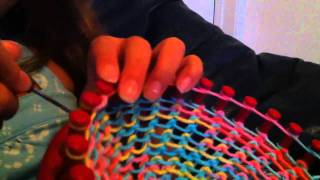 Loom Knitting A Hat [upl. by Harol]