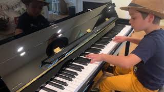 The Entertainer  A fast version played by a 7 yearsold piano prodigy Paul Petrescu [upl. by Enohpets]