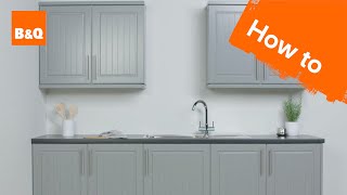 KITCHEN CABINET MAKEOVER  HOW TO PAINT MELAMINE CABINETS  NO ROLLER MARKS [upl. by Hephzipah]