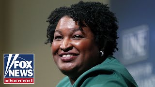 Stacey Abrams deletes tweet after blowback over maskless photo [upl. by Ahseikan]