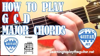 How To Play G C D Major Chords  Learning To Play The Guitar [upl. by Kcira898]