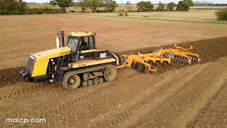 4Kᵁᴴᴰ Caterpillar Challenger 75C amp Simba Solo 380 cultivating stubble in Suffolk [upl. by Enaillil]