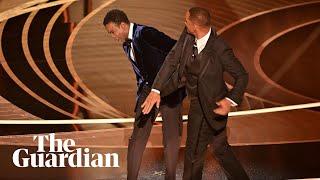 Watch the uncensored moment Will Smith smacks Chris Rock on stage at the Oscars drops Fbomb [upl. by Zennas]