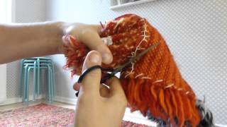 Cutting a flokati rug with scissors [upl. by Osnerol]