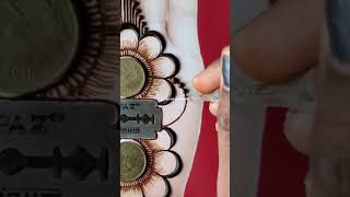 Beautiful mehndi design using blade and coins  video newkavyamehndishorts [upl. by Otis529]