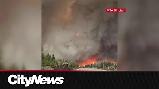 Tens of thousand of hectares continues to burn near Flin Flon pushing smoke across Manitoba [upl. by Kcirdled]