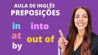 Como usar as preposições de lugar e movimento IN at BY INTO e OUT OF  Aula de inglês [upl. by Vidda]